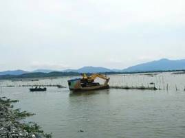 考洲洋养殖清拆整治（左：清拆前）